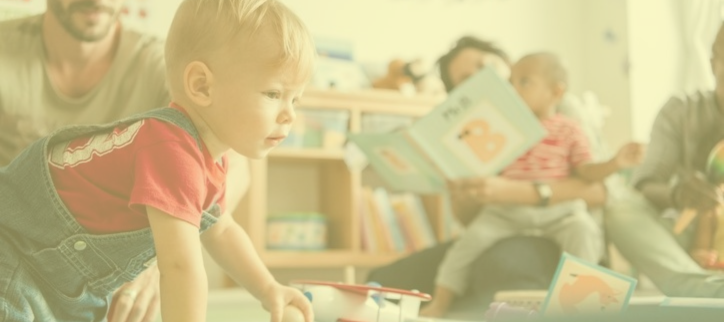 a child playing with toys in a playroom