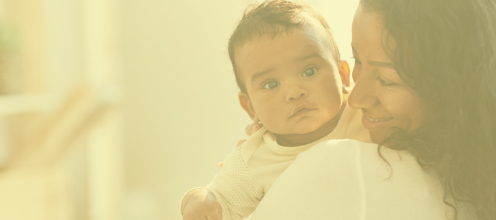 Mother holding a baby in arms