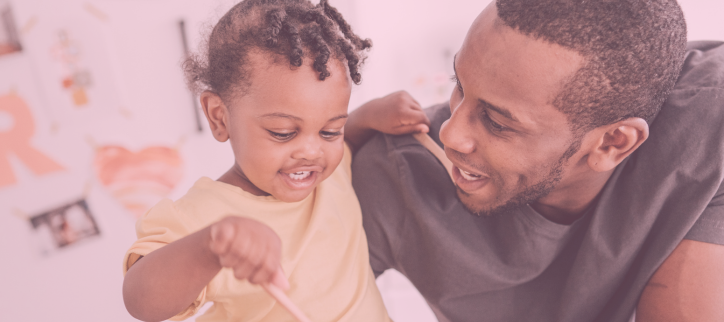 A father playing with his daughter